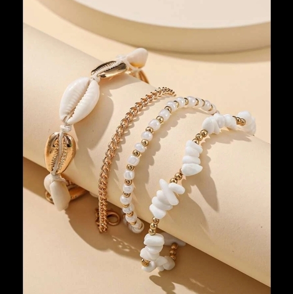 Jewelry - 4 piece Puka Shell Anklet Set